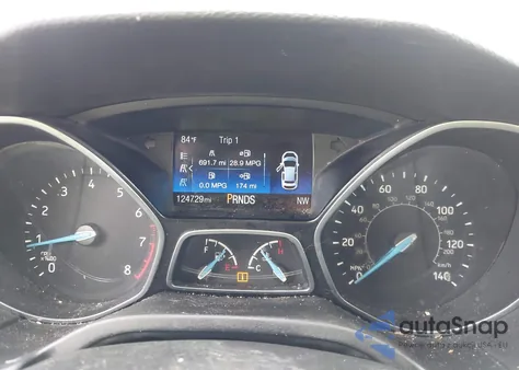 2016 Ford Focus Titanium z USA, uszkodzony, nr VIN 1FADP3J28GL251183